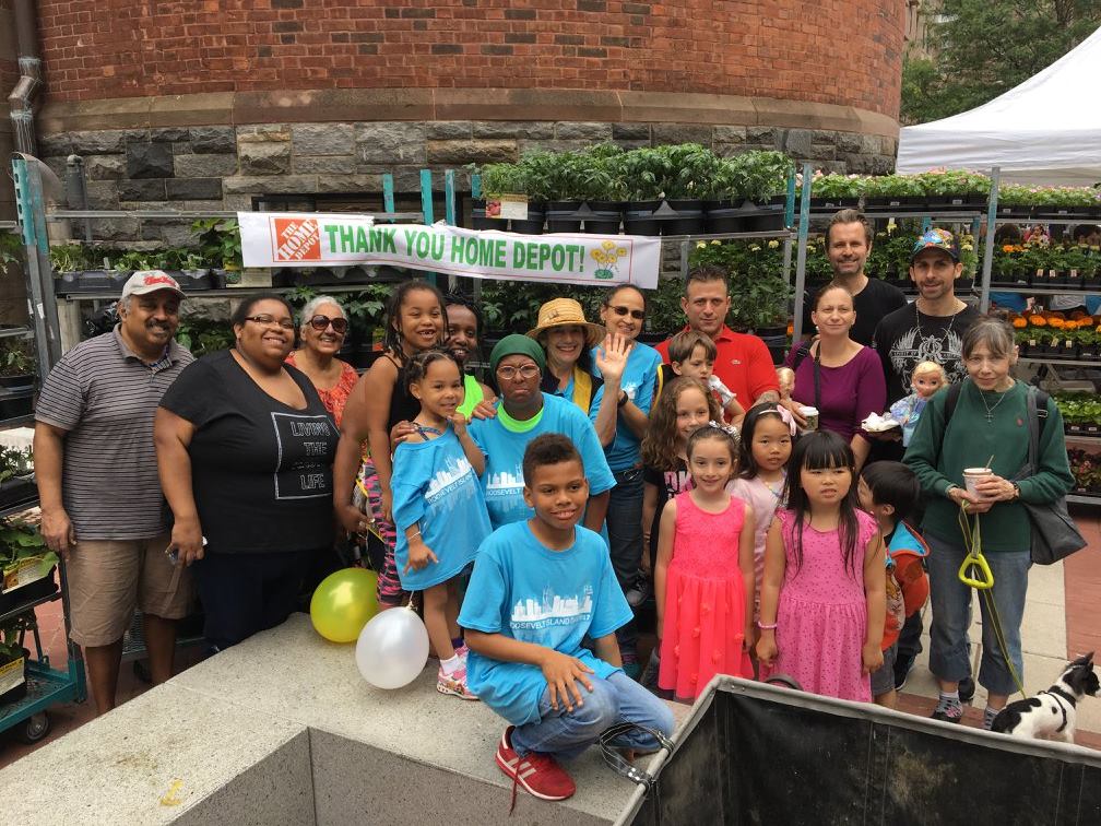 Bonnie Ora Sherk with a group of enthusiastic kids and their parents on Roosevelt Island Day, June 17, 2017 at Roosevelt Island, NYC