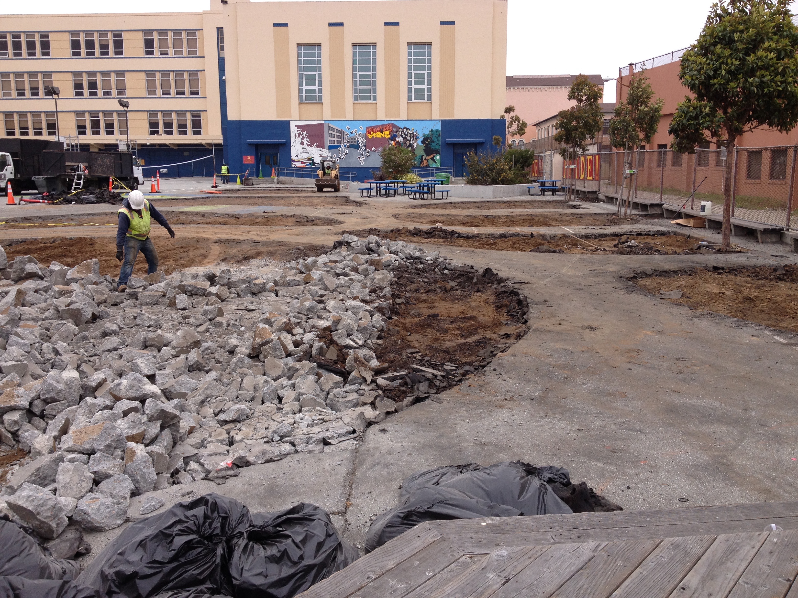 Tons of asphalt and concrete removed at the Rear Yard of James Denman Middle School.