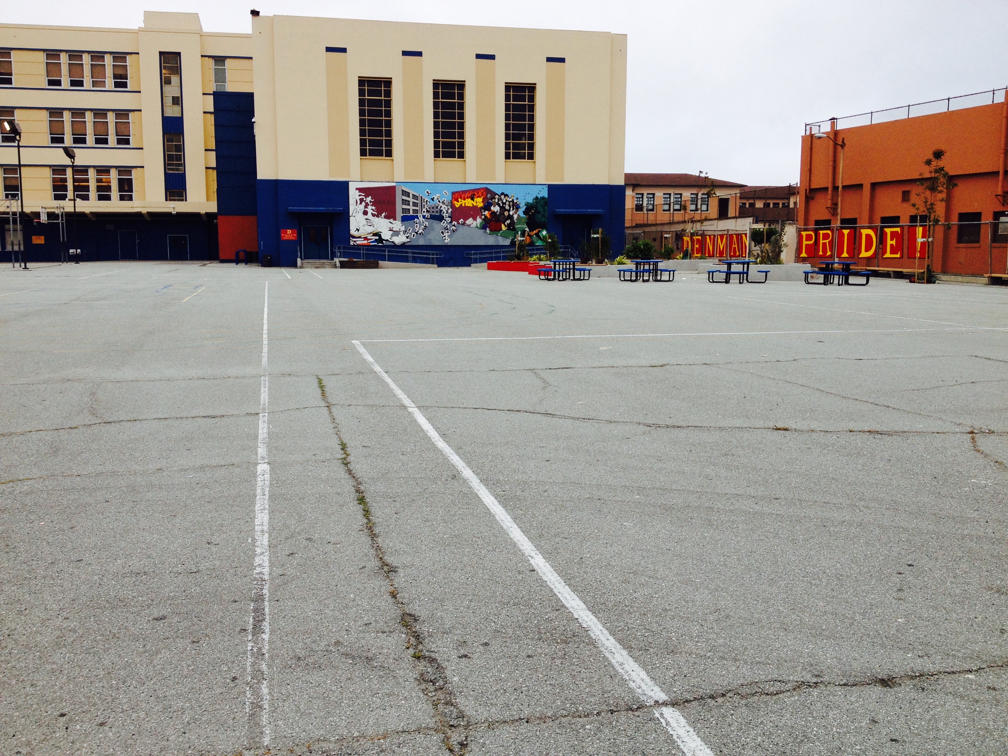 Barren concrete Rear Yard of James Denman Middle School