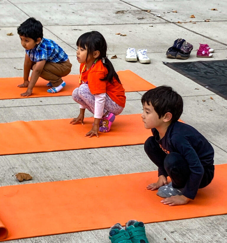 Kids in yoga class at NYC Roosevelt Island garden
